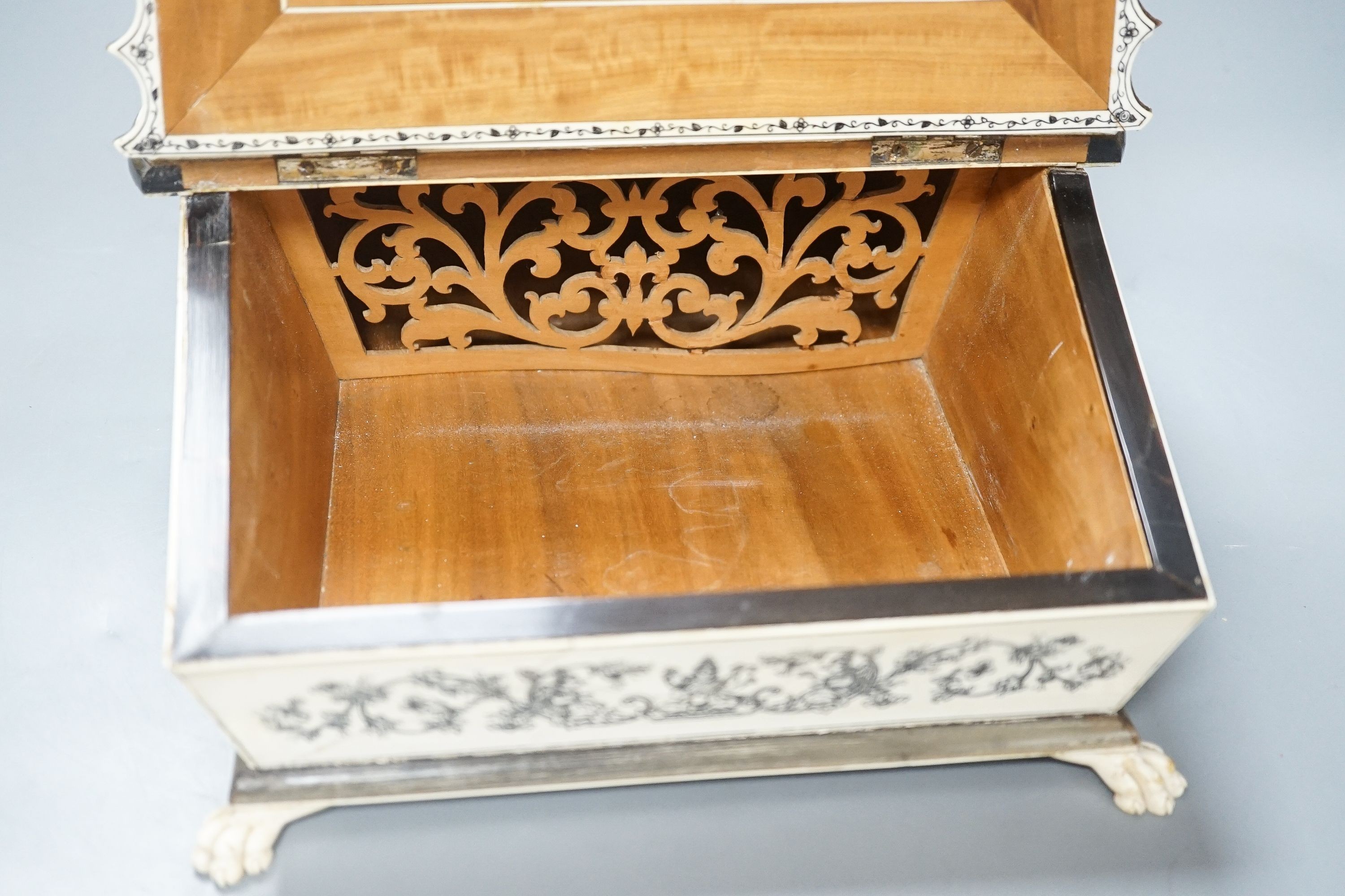 A 19th century Vizagatapatam Ivory and horn swing basket 32cm